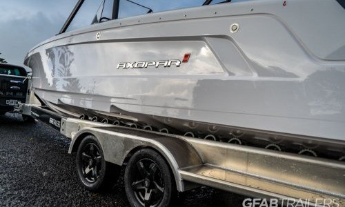 Axopar on roller-bunked tandem GFAB Trailer